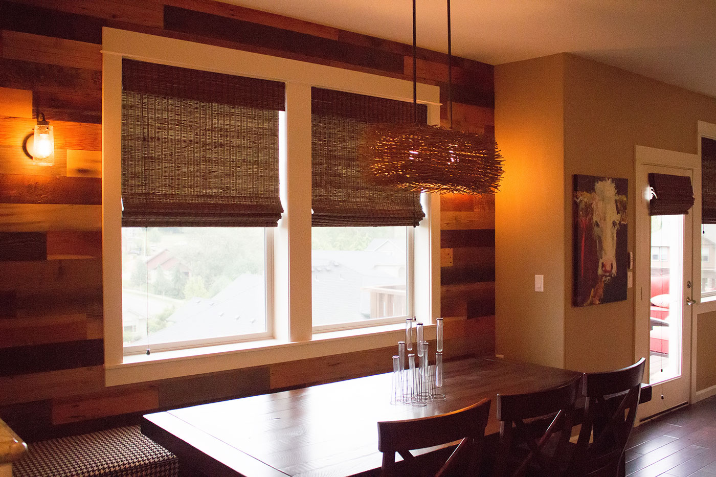 Custom lighting and barnwood detail in modern kitchen design. Rebecca Olsen Designs, Oregon